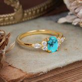Oval Cut 4 Prong Turquoise Classic Side Stone Engagement Ring